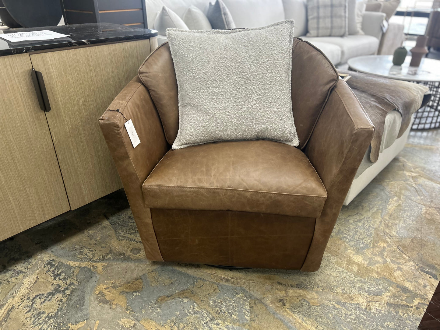 Leather distressed swivel chair